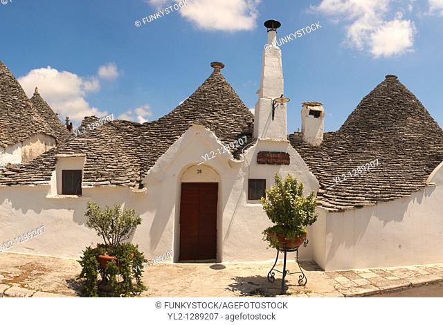 Stone Trulo house with beehive shaped conical roof, traditional Turlli houses of Alberobello, Apulia, Italy