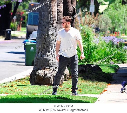 Josh Dallas holds hands with an elderly female companion while out and about Featuring: Josh Dallas Where: Los Angeles, United States When: 04 Jun 2014 Credit:...