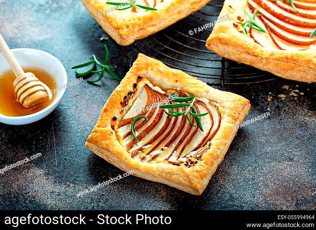 Puff pastries with thinly sliced pear, rosemary and honey, fall seasonal dessert