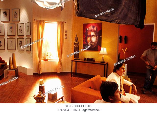 South Asian Indian Bollywood film star Amitabh Bachchan shooting for ad film in Mehboob studio ; Bombay Mumbai ; Maharashtra ; India
