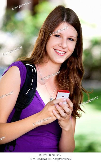 College girl holding cell phone