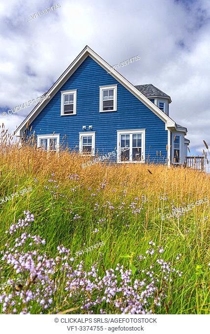 Traditional home along the rugged shores of Newfoundland, Canada