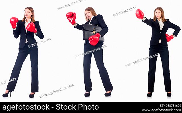 Businesswoman with boxing gloves isolated on white