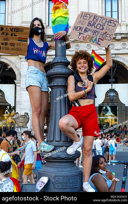 Rome, Italy - June 26, 2021: Universal demonstration for the rights of the LGBT community, march with music and dance, thousands of people parade in the street...