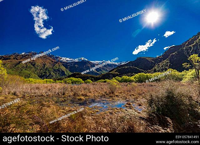 Rocky Mountain and Diamond Lake in the Mt Aspiring National Park near Wanaka, New Zealand