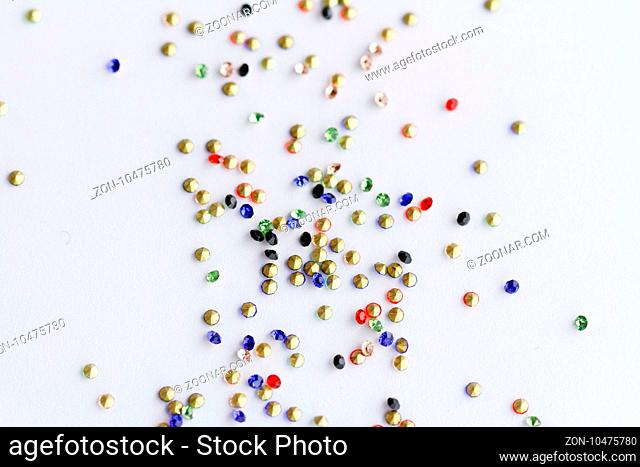 Many small shiny polished glass beads - macro photo