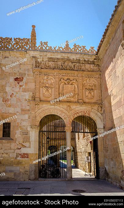 Detail capture showing the entrance to the cloister in the Patio de Escuelas Menores in old Salamanca University buildings, Spain