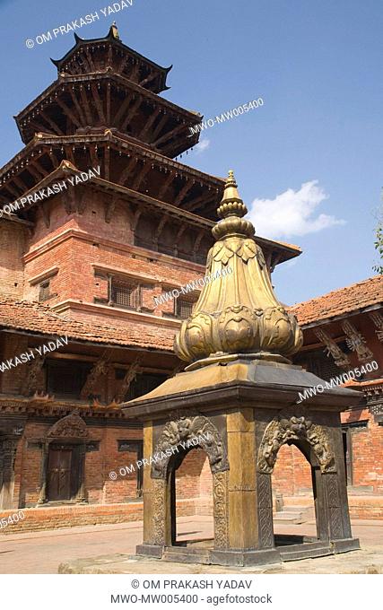 A brass plated temple of 'Devi' in one of the courtyards of the Patan palace During the festival of Dashain Vijaya Dashami hundreds of buffaloes are sacrificed...