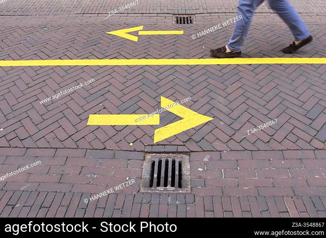 Clear and safe anti corona walking direction in the streets of 's Hertogenbosch, The Netherlands, Europe