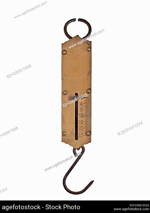 vintage portable brass spring weighing scale isolated over white, clipping path