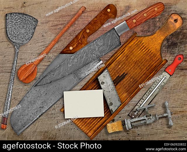 vintage set for cooking over wooden table, space on business card for your text