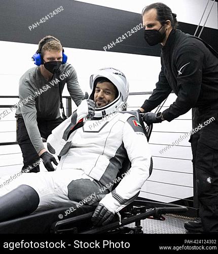 UAE (United Arab Emirates) astronaut Sultan Alneyadi is helped out of the SpaceX Dragon Endeavour spacecraft onboard the SpaceX recovery ship MEGAN after he