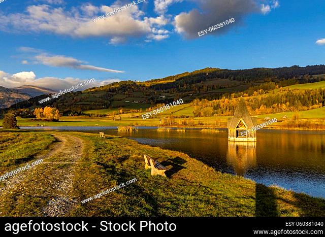 autumn pond under the mountains, Murau district, .Styria, Austria