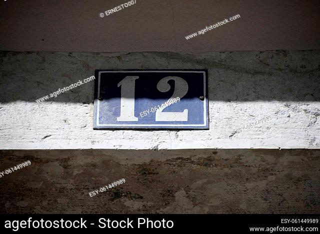 number 12 on a house in Lisbon - Lisboa - the capital of Portugal, September, 2018