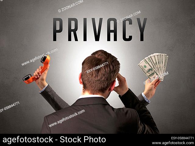 Rear view of a businessman with PRIVACY inscription, cyber security concept