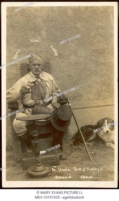 Uncle Tom Cobley sits in his chair, while his dog lies placidly beside him