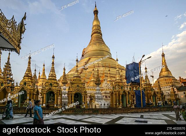 Gilded stupa surrounded by pavilions, shrines, statues, etc. Shwedagon Pagoda complex, Singuttara Hill, Yangon, Myanmar, Southeast Asia