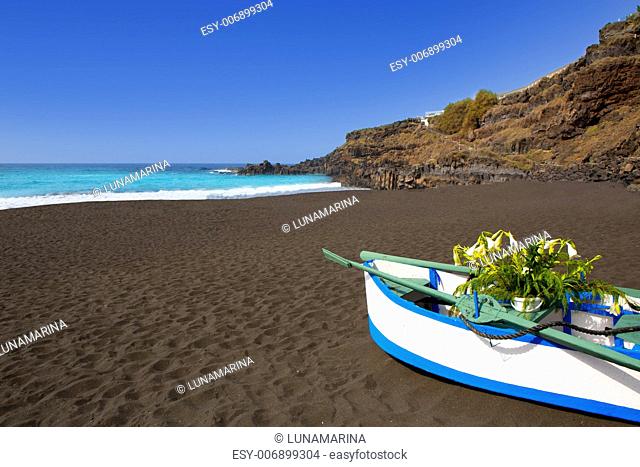 Beach el Bollullo black brown sand and aqua water