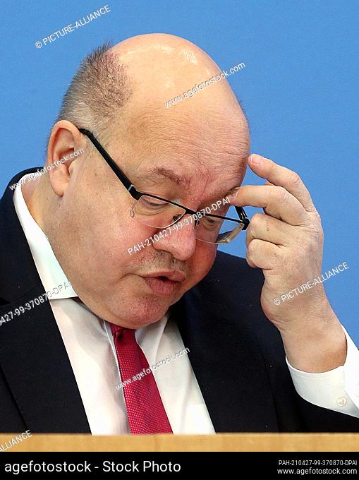 27 April 2021, Berlin: Peter Altmaier (CDU), Federal Minister of Economics, attends the presentation of the Federal Government's Spring Projection 2021 before...