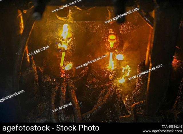 RUSSIA, LUGANSK - DECEMBER 7, 2023: The casting of exhaust valves takes place at AMZ AvtoMotoZapchast, a producer of ICE valves and cooling radiators