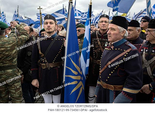Men wearing traditional clothing take part in a demonstration to protest against the use of the name Macedonia following the developments on the issue with the...