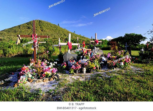 graveyard with decorated graves, New Caledonia, Ile des Pins