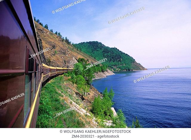 RUSSIA, SIBERIA, LAKE BAIKAL, ""RUSSIA"" SPECIAL TRANS- SIBERIAN TRAIN GOING ALONG LAKE.	1015