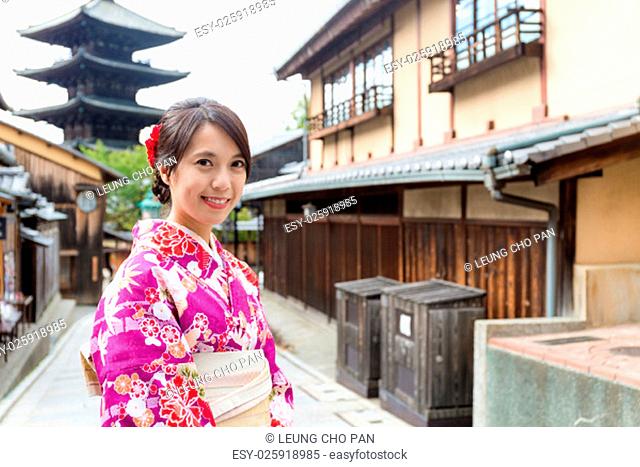Woman with kimono dress in yasaka pagoda