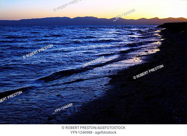 Kyrgyzstan - Lake Song Kul - sunset over the mountains surrounding Lake Song Kul