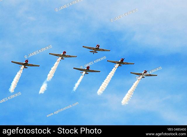 A team of skywriters demonstrate their skill at an airshow in Jones Beach, New York