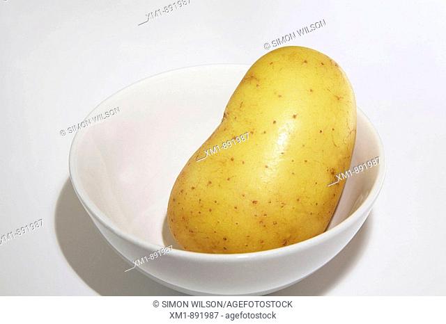 Potato in white bowl