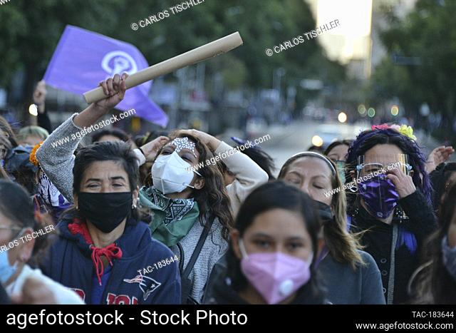 MEXICO CITY, MEXICO - NOVEMBER 2: A woman dressed as Catrina takes part during a march to commemorate victims of femicide