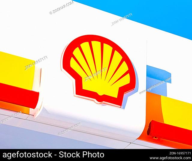Samara, Russia - January 8, 2018: Emblem of the Royal Dutch Shell oil company against the blue sky