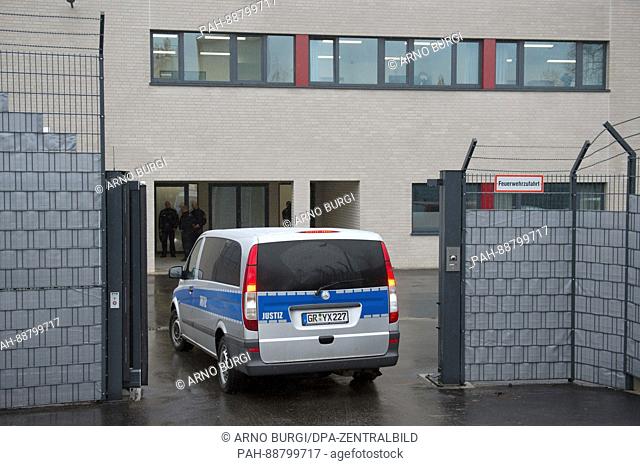 A police car enters the Higher Regional Court in Dresden, Germany, 7 March 2017. On the same day, the high security buildings