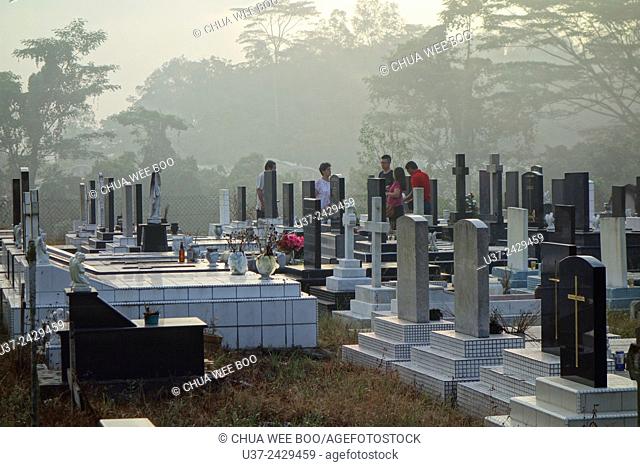 Christian tombstones in the Cemetery, Kuching, Sarawak, Malaysia