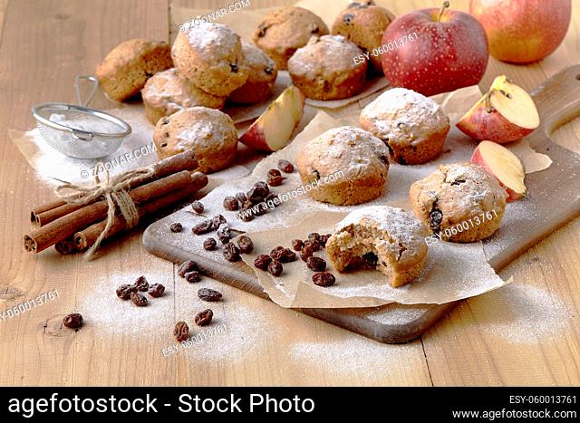 Homemade christmas cake with dried fruits and nuts on rustic wooden table