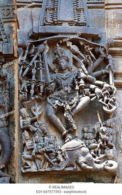 Ornate wall panel reliefs depicting Shiva dancing on the head of Gajasura, Chennakesava temple, Belur, Karnataka, india