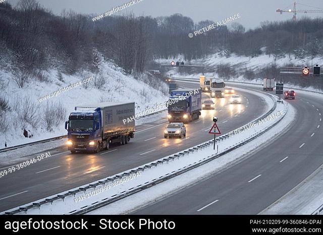 09 February 2021, Saxony, Dresden: Cars and trucks travel on Highway 17 in the early morning. Photo: Sebastian Kahnert/dpa-Zentralbild/dpa