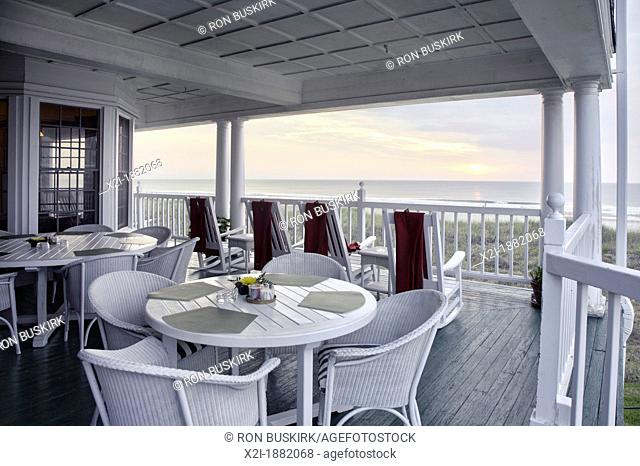 Scenic view of sunrise over the Atlantic Ocean from porch of Elizabeth Pointe Lodge at Amelia Island, Florida