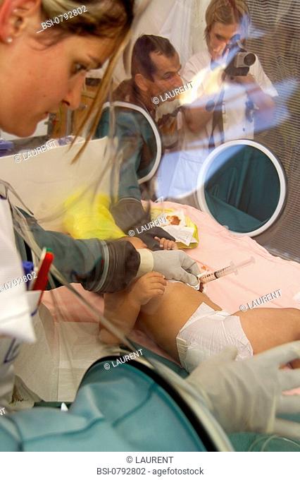 IMMUNE DEFICIENCY<BR>Photo essay.<BR>Necker Hospital for Children in Paris, France. Baby bubble. Child suffering immune deficiencies in sterile room with father...