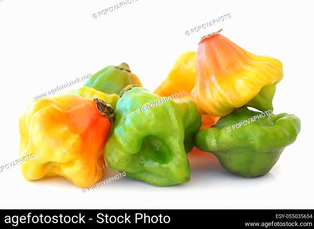 Scotch bonnet peppers on white background