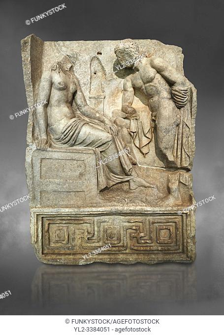Roman Sebasteion relief sculpture of Io and Argos Aphrodisias Museum, Aphrodisias, Turkey. Against a grey background.