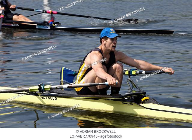 England, Oxfordshire, Henley-on-Thames, A competitor pulling hard in a single sculls race at the annual Henley Royal Regatta