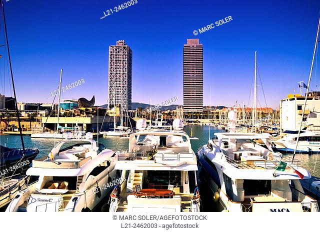 Yachts at Olympic port. Mapfre tower and Hotel Arts near Olympic harbour. Olympic Village, Barcelona, Catalonia, Spain
