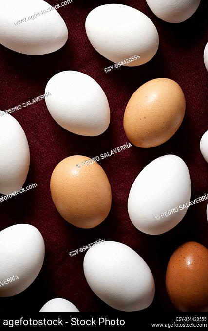Chicken eggs on a cloth tablecloth