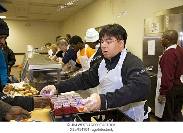 Detroit, Michigan - Volunteers serve lunch at the Capuchin soup kitchen  The soup kitchen dates to 1929 and now serves about 1600 meals a day  It is operated by...