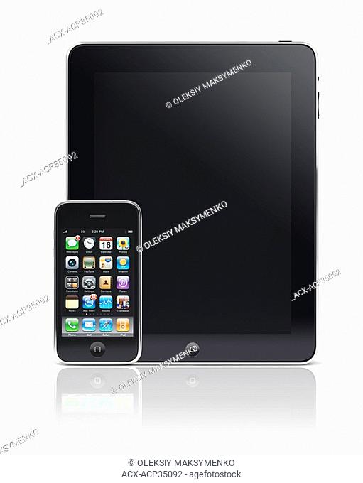 Apple iPhone 3Gs smartphone Apple iPad tablet isolated with clipping path on white background