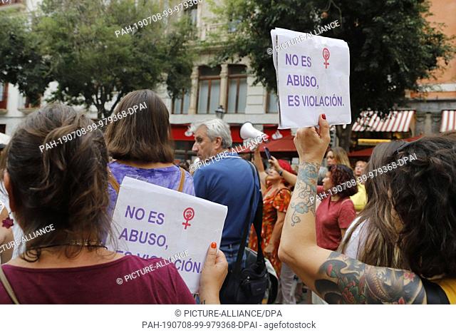 08 July 2019, Spain, Palma: Participants of a demonstration against sexual violence hold signs with the inscription ""No es abuso