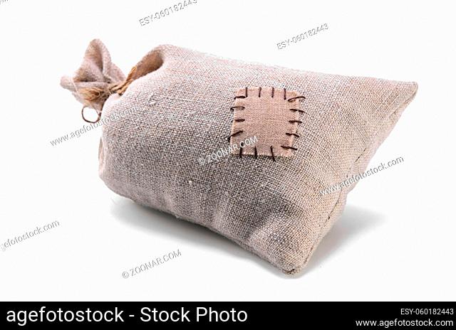 bag coarse fabric with botch on white background with soft shadow