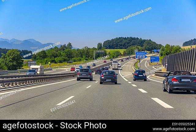 Germany. Summer sunny day. Road traffic on a country high-speed highway